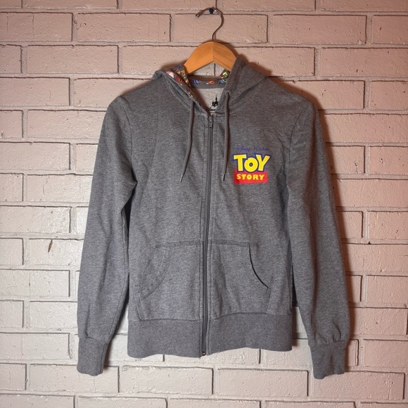 Disney Tops - Gray size XSmall Toy Story Disney Parks  full zip sweatshirt.